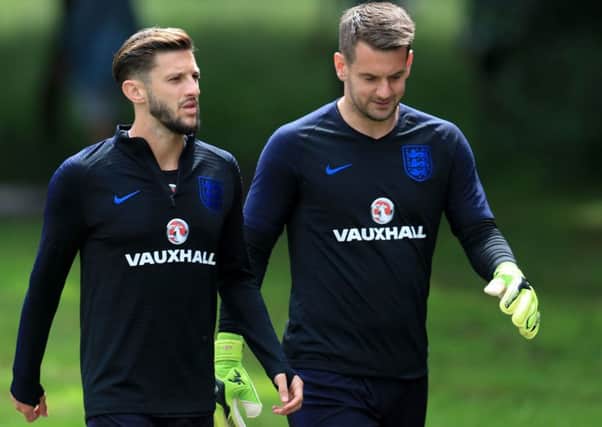 England's Adam Lallana (left) and Tom Heaton during a training session at The Grove Hotel, London. PRESS ASSOCIATION Photo. Picture date: Friday June 1, 2018. See PA story SOCCER England. Photo credit should read: Mike Egerton/PA Wire. RESTRICTIONS: Use subject to FA restrictions. Editorial use only. Commercial use only with prior written consent of the FA. No editing except cropping.