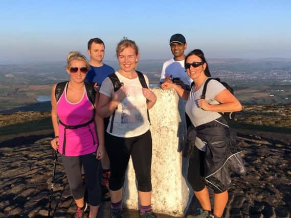 The NICU Three Peaks Team out training at the top of Pendle Hill