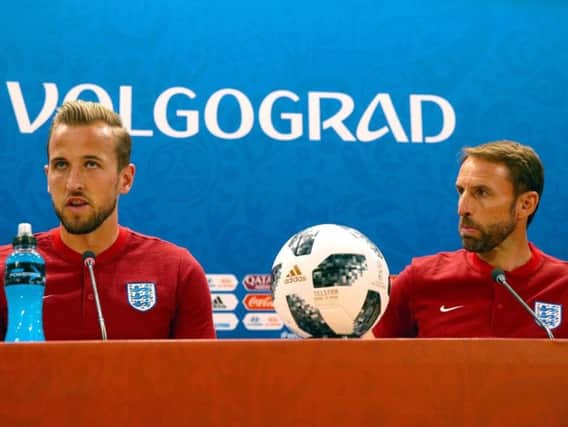 England captain, Harry Kane (left) with England manager, Gareth Southgate, in Volgograd.