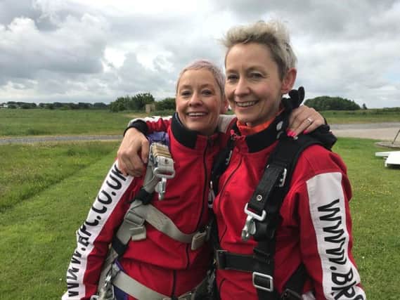 Linda and Julie prepare for their skydive