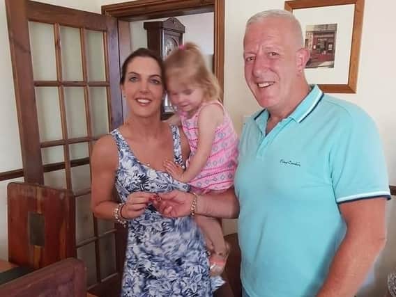 Dave hands over the lost engagement and wedding rings to a very relieved and delighted Claire and her little girl Amelia.
