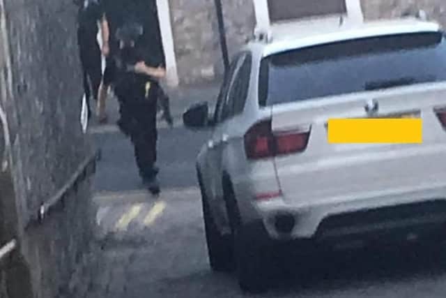 Lancashire police have arrested four people on suspicion of firearms offences in Clitheroe and Nelson