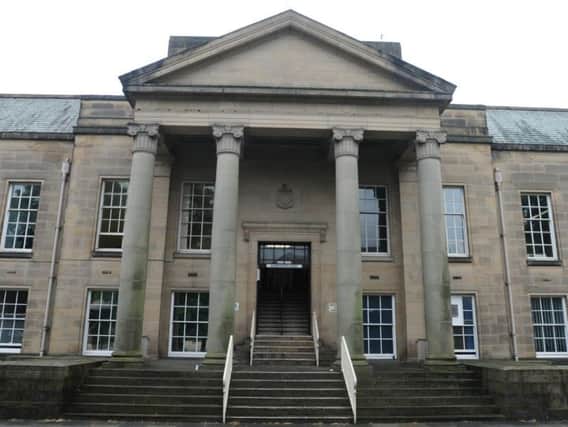 A Colne man tried to make off with a trolley packed with 424 worth of goods from Burnley's Tesco store, a court has heard.