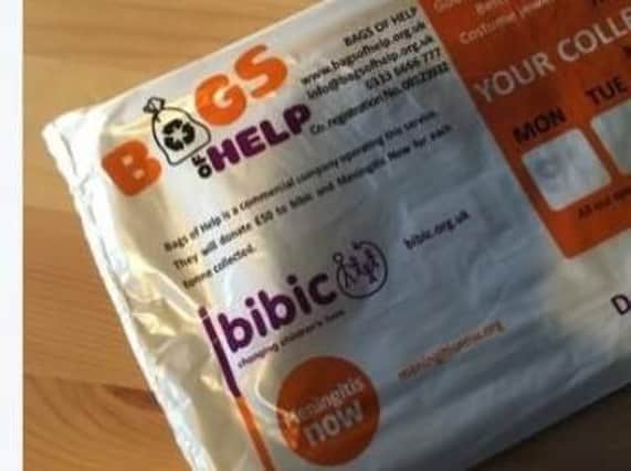 The fraudulent charity collection bags featuring both Meningitis Now and bibic branding.