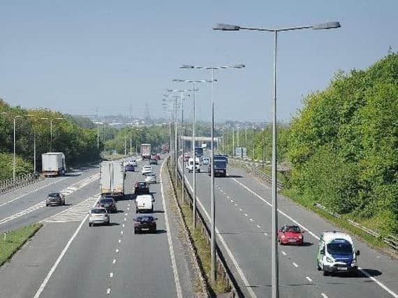 The M65 has been closed by police between junctions six and five