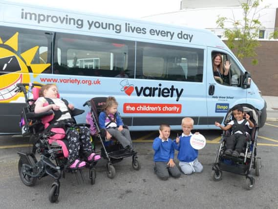 Pupils at Holly Grove School can now go on trips out thanks to a new minibus which is wheelchair-friendly. (s)
