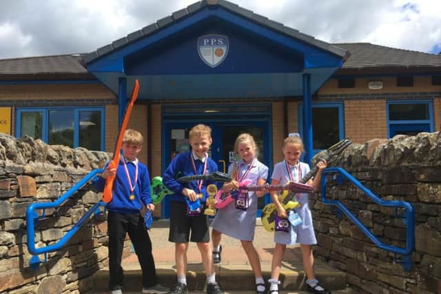 Kian Parkinson, Alfie Stevenson Tia Butterworth and Isobel Olerenshaw are proper little rock stars when it comes to their times tables.