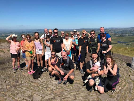 There were smiles all round from staff at Sagar Insurances, who were joined by family, friends and clients, for the challenge to climb Pendle Hill.