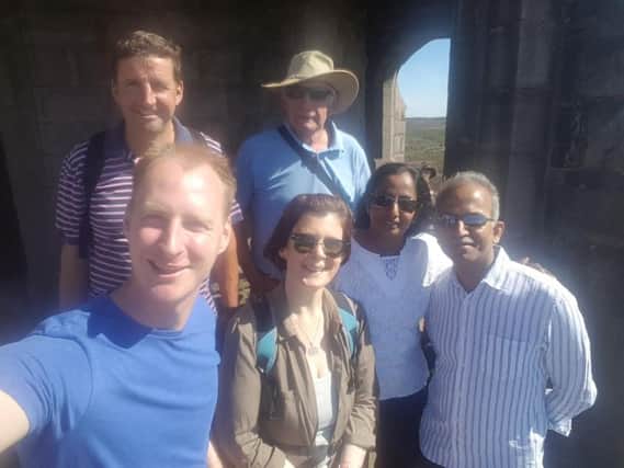 Down in number but hopeful of new team mates are Rosemere Cancer Foundations Dan Hill, supporters David Bristol, John Hacking and
Maria Adamson with Dr Jeyaram and Mrs Krishna Srinivasan on a training
trek to Darwen Tower.