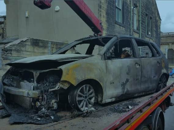 Shocking image of the burnt-out car released by police