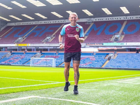 Burnley fan Scott Cunliffe is planning on running 3,000 miles this season.