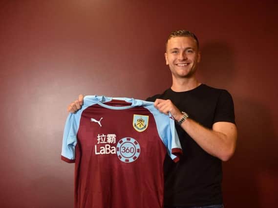 Defender Ben Gibson became Burnley's first signing of the summer after joining on a four-year deal from Middlesbrough.