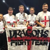 Burnleys Dragons show off their medals from the WKO World Kickboxing Championships