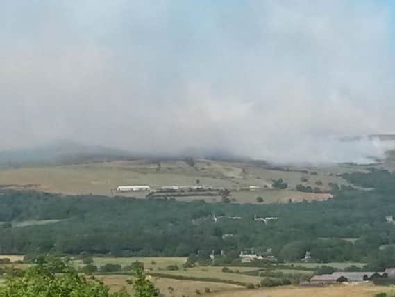 Rivington Pike obscured by smoke.