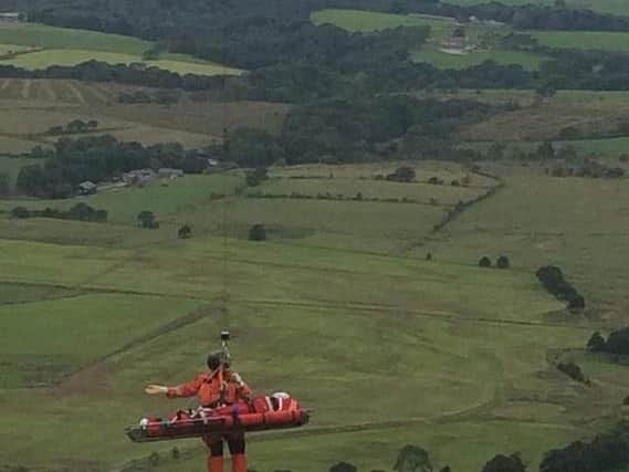 The injured paraglider was airlifted to hospital