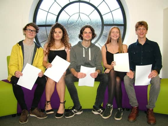 Paul Bell celebrates along with his clever fellow students Connor Nutter, Daniel Riding, Shannon Shoreman and Alisha Walsh