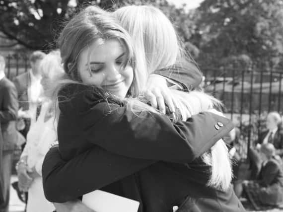 Nerves, hugs and tears of joy as students open their A-Level results