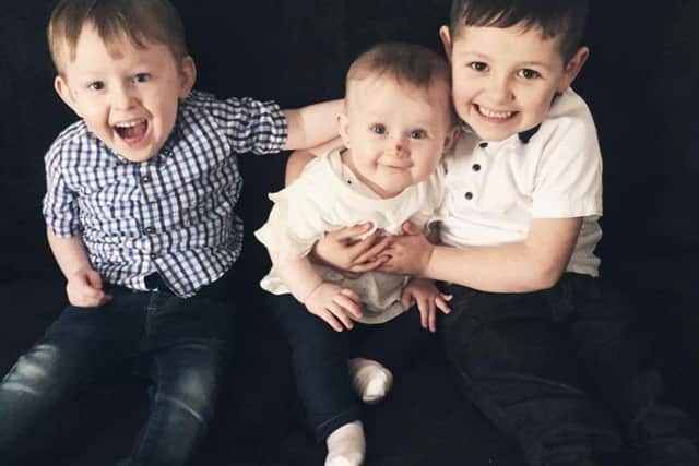 Darcy-Mae with her brothers, Jordan and Riley.