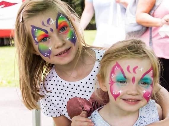 These two little girls were transformed into butterflies for the day at the Padiham Party in the Park.