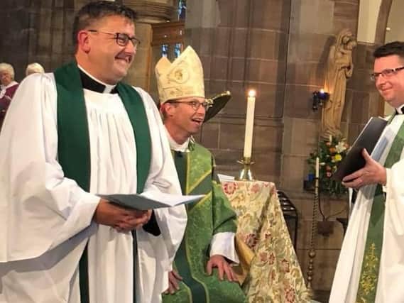 Bishop of Burnley Philip North(C), Fr Alex Frost (L) and the Bishops chaplain Fr David Stephenson (R)