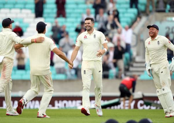 England's James Anderson celebrates taking his 564th wicket
