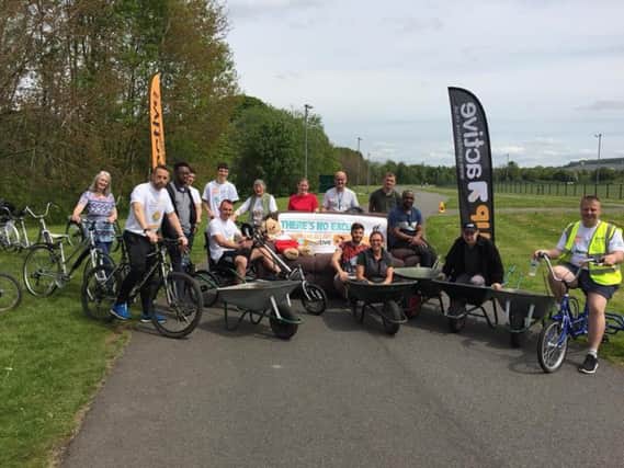 Caroline Holden from Connecting East Lancashire working with Nelson-based Pendle Leisure Trust recently. The trust is introducing cycle shelters and pool bikes to help employees cycle.
