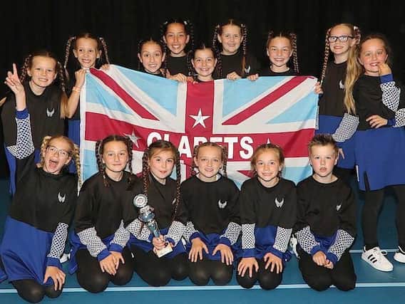 Clarets Cheeleaders junior A team are pictured after winning gold at the European Cheerleading Championships in Europe.