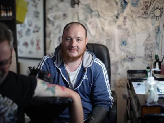 Scott Heffernan at his tattoo parlour, Timeless Tattoos, in Burnley.
