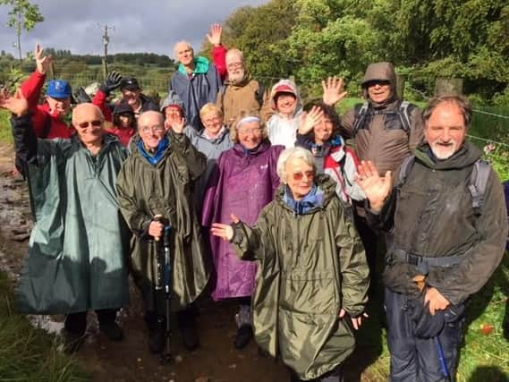 Visitors from Burnley's twinned town Vitry-sur-Seine enjoying some typical British weather