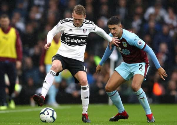 Andre Schurrle, pictured with Burnley's Matt Lowton, was a handful at Craven Cottage