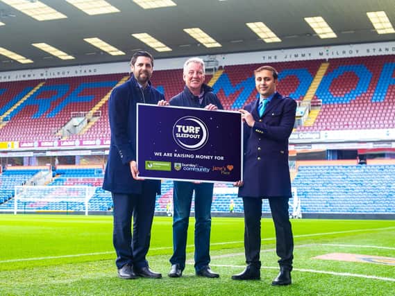 Burnley FC in the Community's Neil Hart with Coun. Mark Townsend and Lukman Patel.