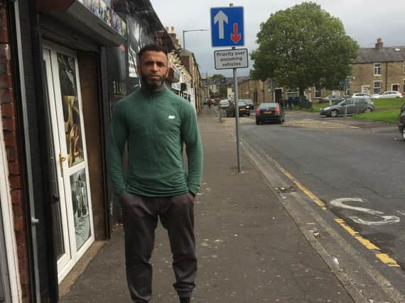 Buddy Khan outside his gym, the Muscle Factory in Daneshouse Road, Burnley close to the scene of car crash where a driver ploughed into a lamp-post.
