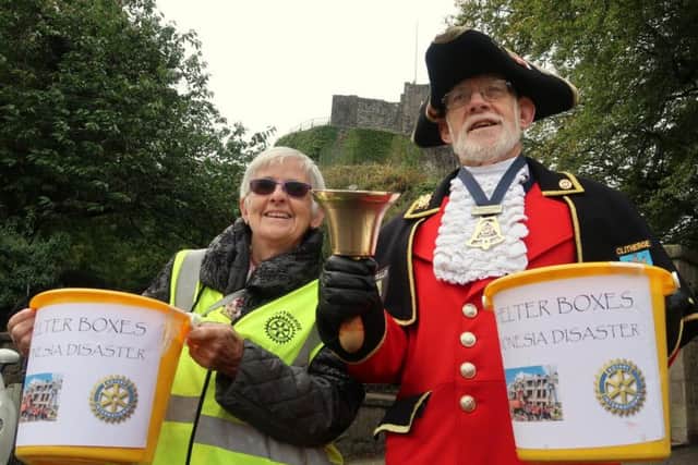 Clitheroe Town Crier Roland Hailwood and his wife Hazel during the recent collection.