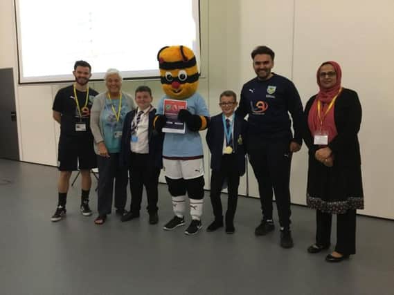 Bertie Bee with organisers and students at the Diversity Day football tournament