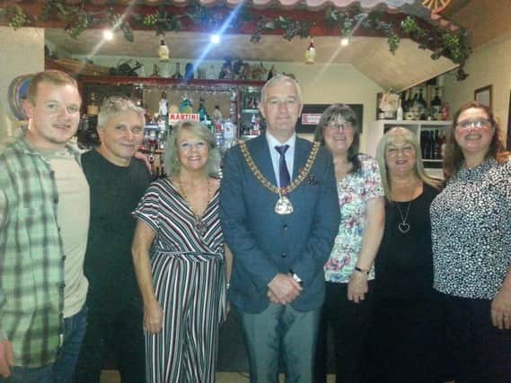 The Mayor of Burnley, Coun. Charlie Briggs and Mayoress Patricia Lunt with member of the fundraising committee and the owners of Mamma Mia