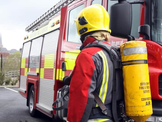 Firefighters wearing breathing apparatus dealt with a kitchen blaze in Nelson yesterday.