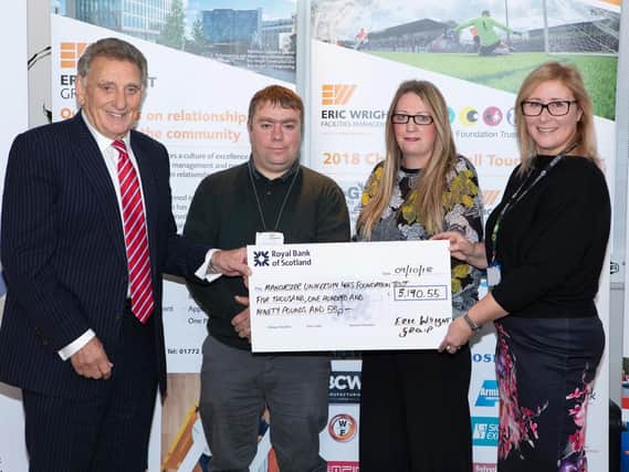 Pictured at the cheque presentation after the charity football tournament are (from left to right) Eric Wright, Chairman of the Eric Wright Group, Ethan's parents Andrew and Melanie Hunt and Penny Hammer, Corporate Fundraising Manager Manchester Foundation Trust Charity