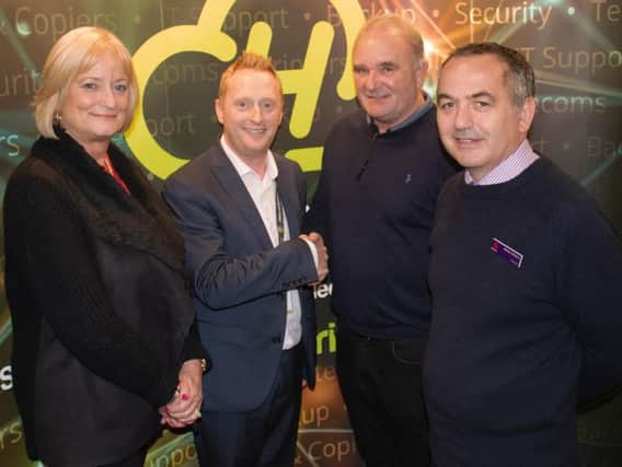 Brian Williams, managing director at A&B Containers Ltd (centre right) is welcomed to the event by Matthew Metcalfe, managing director at Holker IT, with Shirley Williams (A&B Containers Ltd) and Adrian Waters (premier manager NatWest) looking on