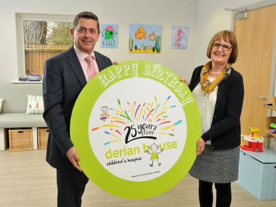 David Robinson and Julie Atherton at Derian House  mark the launch of its 25th anniversary campaign
