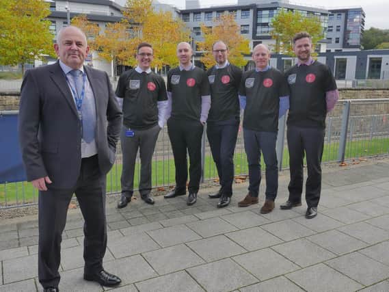 The Burnley College fund-raisers are pictured, back, from the left: Dave Lord, Chris McDonald, Paul Whittaker, Solomon Whittaker and Simon Jordan, with Ralph Stone, front.