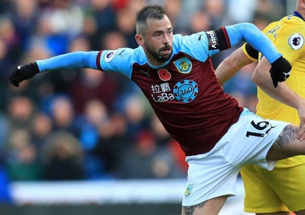 Burnley's Steven Defour (left) and Chelsea's Ross Barkley battle for the ball during the Premier League match at Turf Moor, Burnley. PRESS ASSOCIATION Photo. Picture date: Sunday October 28, 2018. See PA story SOCCER Burnley. Photo credit should read: Mike Egerton/PA Wire. RESTRICTIONS: EDITORIAL USE ONLY No use with unauthorised audio, video, data, fixture lists, club/league logos or "live" services. Online in-match use limited to 120 images, no video emulation. No use in betting, games or single club/league/player publications