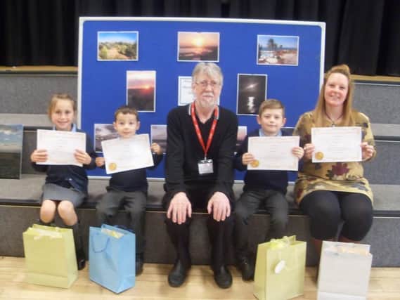 Competition winners with judge Chris McKae at St John the Baptist RC Primary School in Padiham's first photographic competition.
