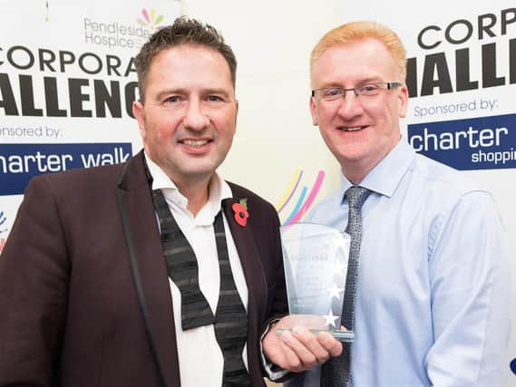 Man of the Year Award presented to Ian Bythell of Petty Estate Agents by Stuart Applegate of HK Applegate Insurance Brokers.