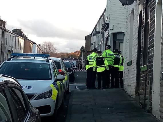 Bomb squad officers are searching a house in Dall Street, Burnley.