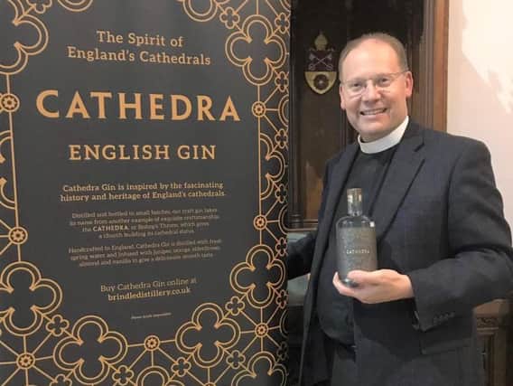 Dean of Blackburn the Very Rev Peter Howell Jones with Cathedra gin