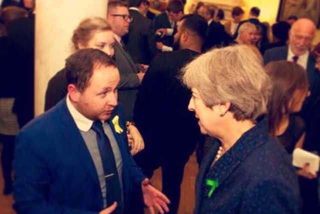 Jordan takes the opportunity to get his points across Prime Minister Theresa May at the Downing Street reception for World Mental Health Day.