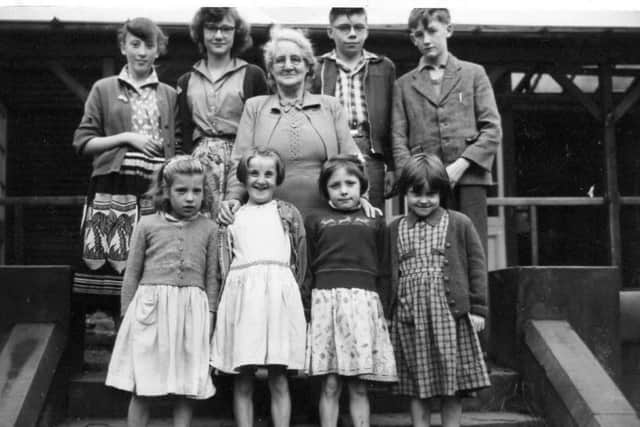 Mick (back row, third from left) with fellow pupils and a teacher at the open air school he attended in Burnley.