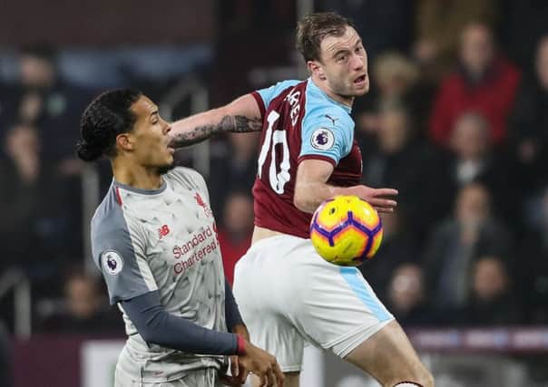 Burnley's Ashley Barnes competing with Liverpool's Virgil van DijkPhotographer Andrew Kearns/CameraSportThe Premier League - Burnley v Liverpool - Wednesday 5th December 2018 - Turf Moor - BurnleyWorld Copyright Â© 2018 CameraSport. All rights reserved. 43 Linden Ave. Countesthorpe. Leicester. England. LE8 5PG - Tel: +44 (0) 116 277 4147 - admin@camerasport.com - www.camerasport.com