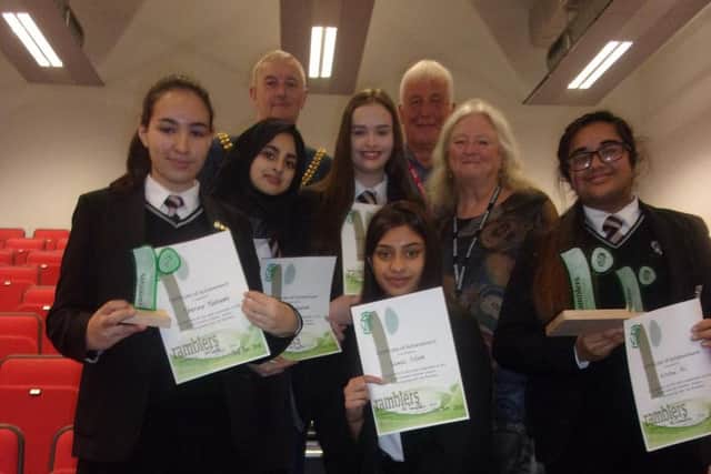 Students celebrate with the Mayor of Burnley Coun. Charlie Briggs (back left) and  Glenda Brindle School, Secretary of the Blackburn and Darwen Group
of the Ramblers and Michael Counter, Chairman of the North East Lancashire Area of the Ramblers.