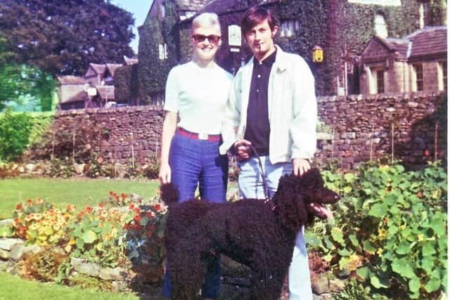 Philippe with his wife Susan and their poodle Georgie.